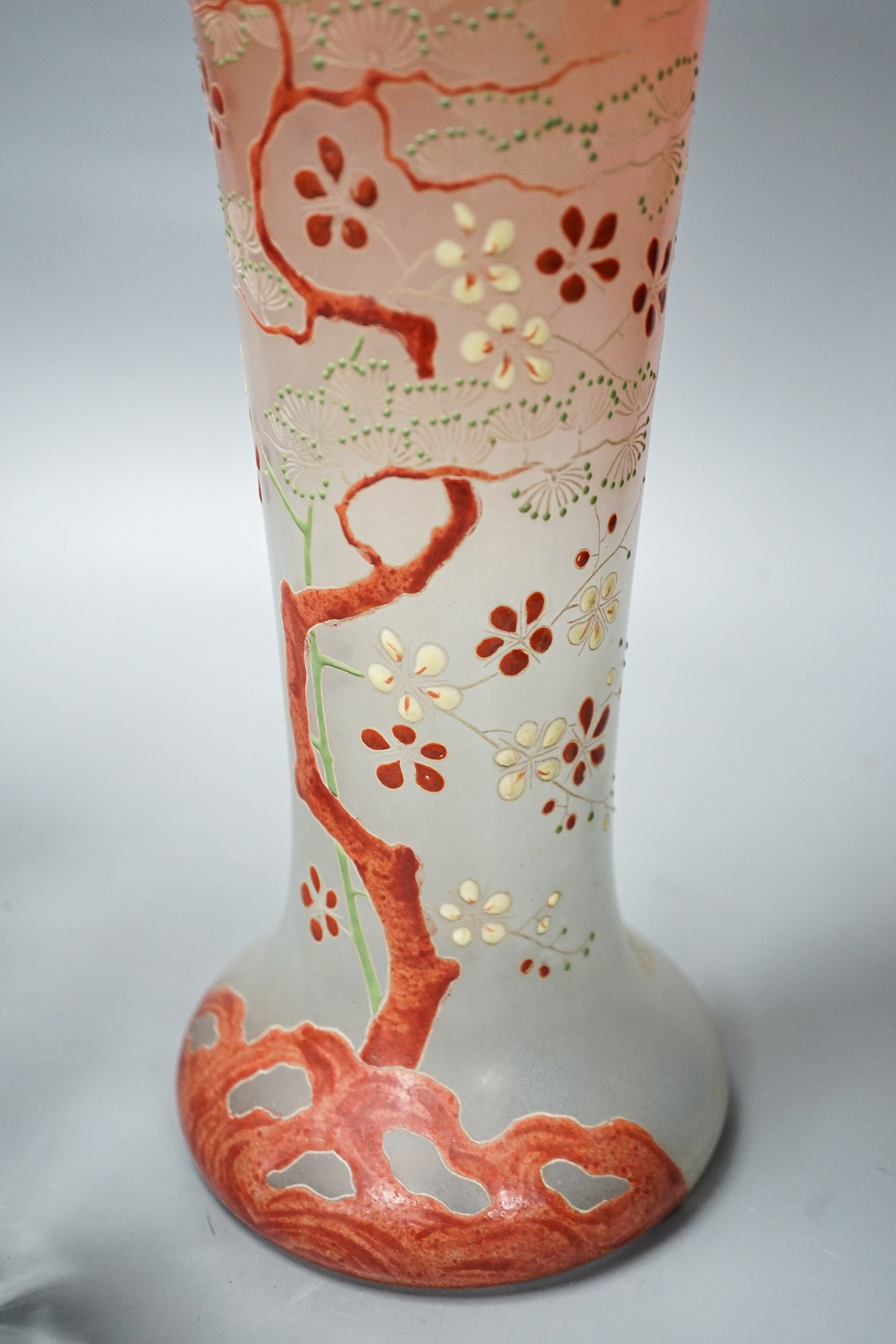 A tall Bohemian enamelled glass vase, 35cm, manner of Moser, a Moser heavy facet cut glass vase, 29.5cm, etched mark, and a Baccarat moulded glass vase (3)